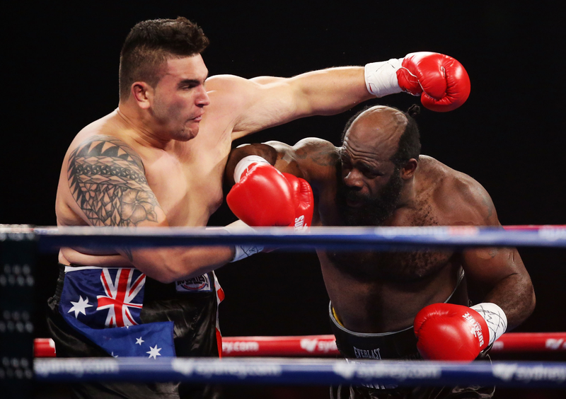 Kimbo Slice (right) fights Shane Tilyard at the Sydney Entertainment Centre on Jan. 30, 2013. Matt King/Getty Images